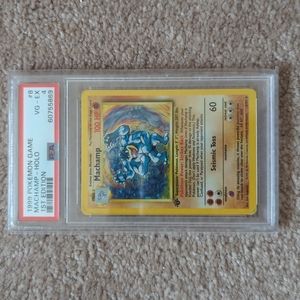 PSA 4 1st Edition Machamp Holo from Pokemon Base Set.